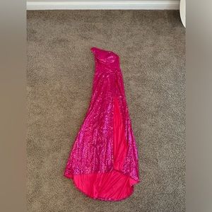 Hot pink, one shoulder, sequined prom dress.